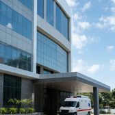 Example frame: a hospital tower with an ambulance at the entrance